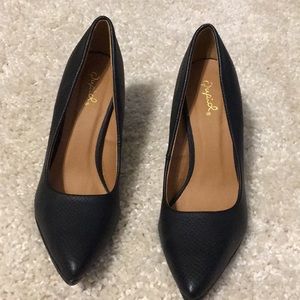 Black snakeskin style heels